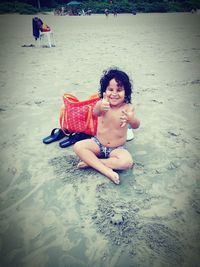 Portrait of happy boy on beach