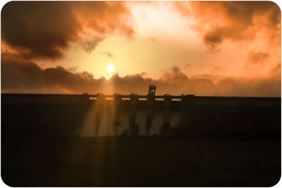 Scenic view of cloudy sky at sunset