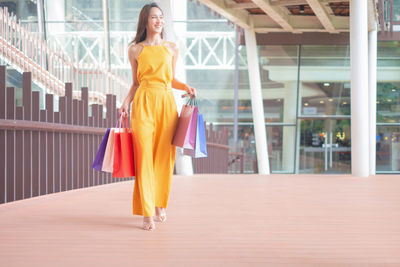 Full length of woman standing outdoors