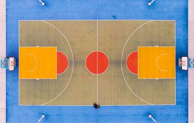 High angle view of basketball hoop against blue wall