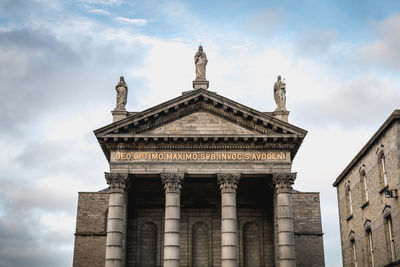 Low angle view of historic building against sky