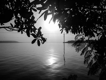 Scenic view of sea against sky at sunset