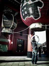 Woman standing at night