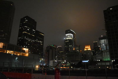 Illuminated cityscape at night