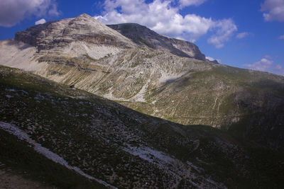 Scenic view of rocky mountains against sky in dolomites 