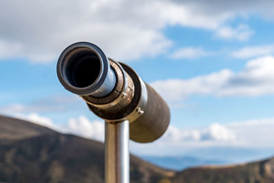 Low angle view of camera against sky