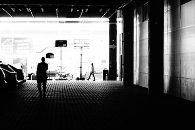 Full length of woman walking in city