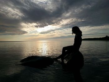 Scenic view of sea at sunset