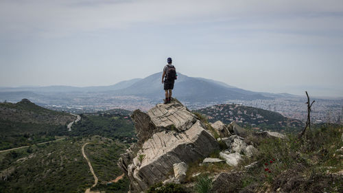 Scenic view of landscape and mountains against sky