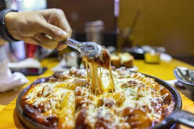 Close-up of person preparing food