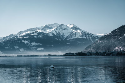 Scenic view of snowcapped mountains against sky