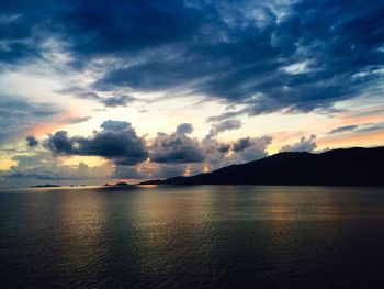 Scenic view of sea against dramatic sky