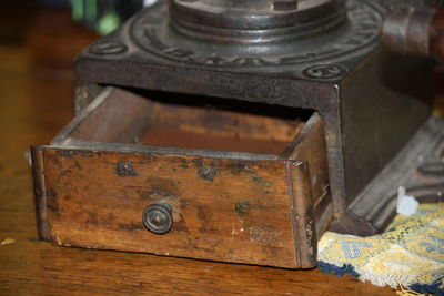Close-up of old metal on table