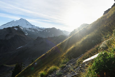 Scenic view of snowcapped mountains against sky