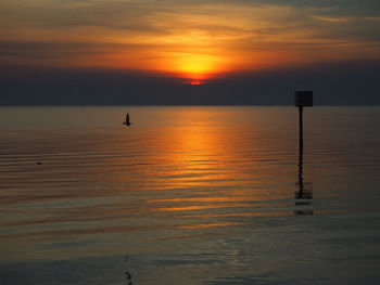 Scenic view of sunset over sea