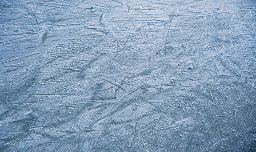 Blue ice in skate scratches