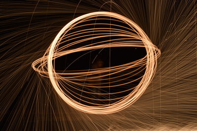 Light trails on fire at night