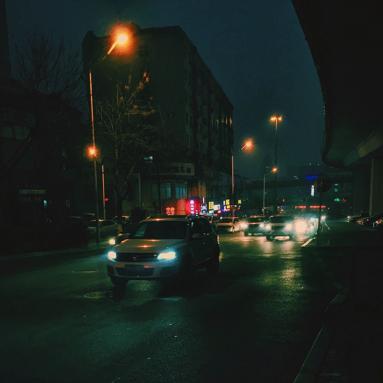 wet, night, transportation, car, rain, illuminated, rainy season, street, city, land vehicle, no people, road, raindrop, outdoors, water, sky