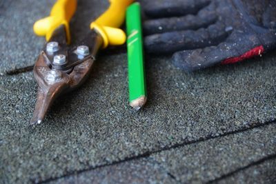 High angle view of multi colored pencils on floor