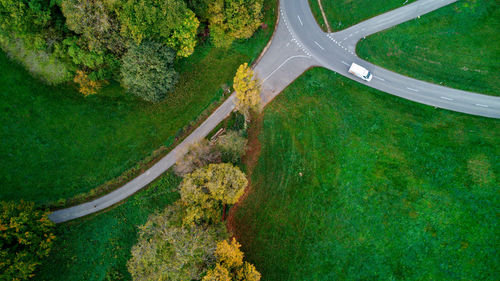 High angle view of road amidst trees