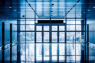 Modern building seen through glass window