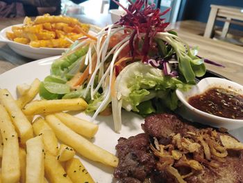 Close-up of food served on table