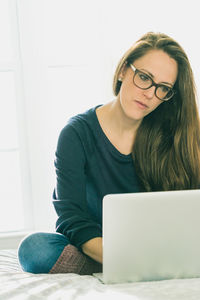 Young woman using mobile phone