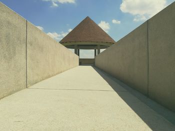 Corridor against sky