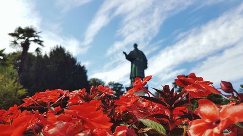Low angle view of statue against sky