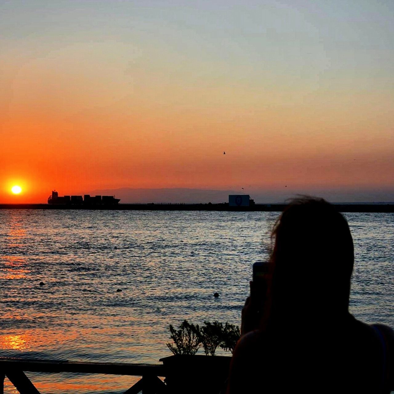 sunset, sea, water, silhouette, orange color, horizon over water, sun, scenics, beauty in nature, tranquil scene, tranquility, sky, nature, idyllic, transportation, nautical vessel, leisure activity, mode of transport