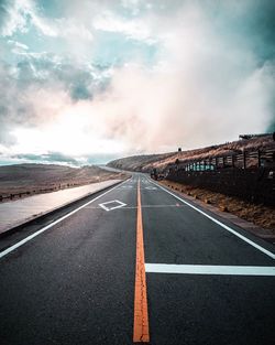 Surface level of road against sky