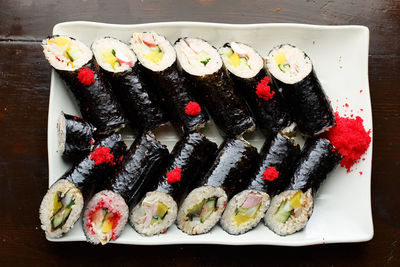 High angle view of sushi served on table