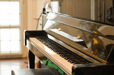 Close-up of piano at home