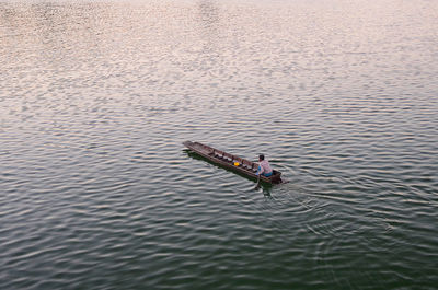 High angle view of man on boat in river