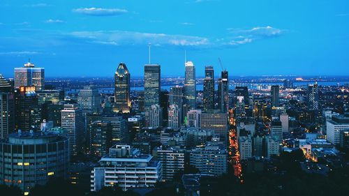 High angle view of cityscape against sky at night