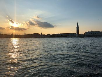 View of buildings against sky during sunset