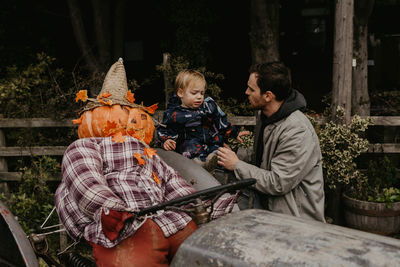 Father and son in autumn