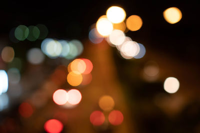 Defocused image of illuminated christmas lights