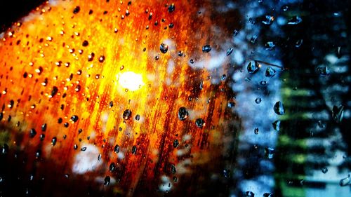 Close-up of water drops on glass