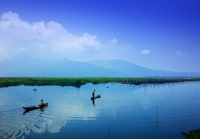 Scenic view of lake against sky