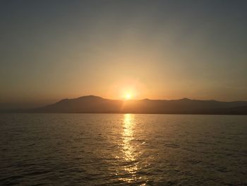 Scenic view of mountains at sunset