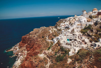 High angle view of santorini and sea against sky