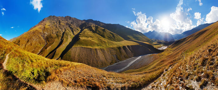 Panoramic view of mountains against sky