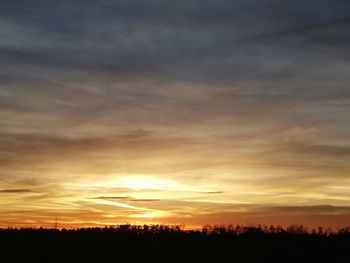 Scenic view of dramatic sky during sunset