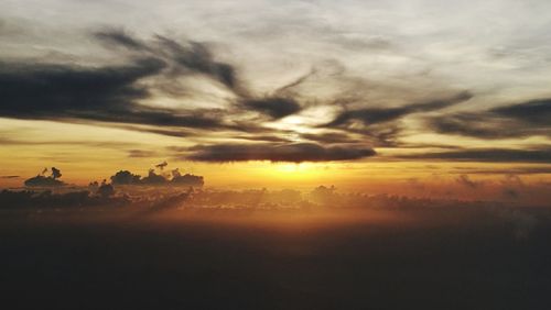 Scenic view of silhouette landscape against sky during sunset