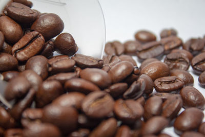 Close-up of coffee beans on table