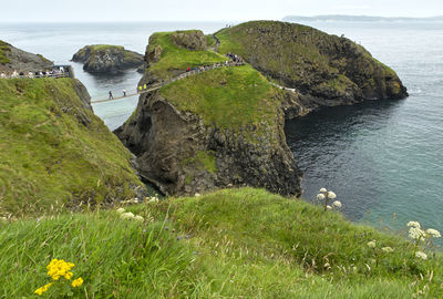 Scenic view of rocks on sea shore