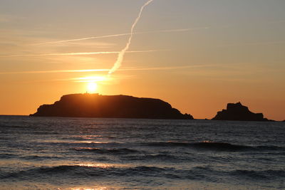 Scenic view of sea against sky during sunset