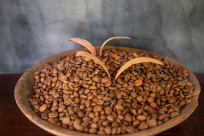 Close-up of coffee beans on table