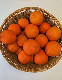 High angle view of oranges in basket